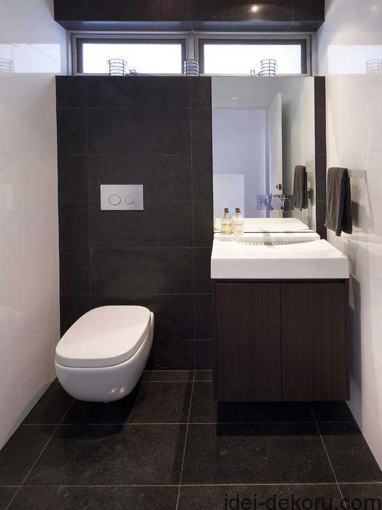 cozy-toilet-design-with-black-color-scheme-fnished-in-modern-design-and-small-bathroom-sink-unit-as-fetching-model