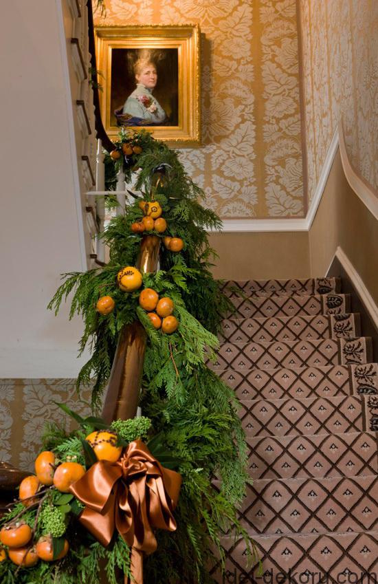 Fragrant pomanders adorn the Blair House staircase during the holidays.