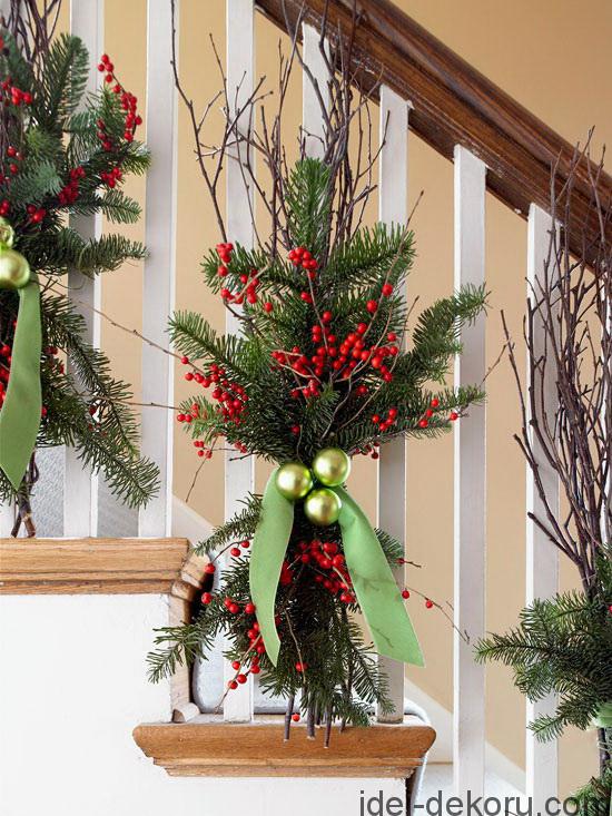 Decorate Your Staircase For Christmas by BHG - Instead of swags of greenery trailing down the banister, try these greenery bunches. Natural birch branches form the backbone, but red twig dogwood or other branches would work just as well. Use thin florist's wire to lash them to the banister posts along with evergreens and sprays of bright red winterberries. Matte and glossy chartreuse ornaments add pops of color. Tie it all together with a chartreuse velvet ribbon.