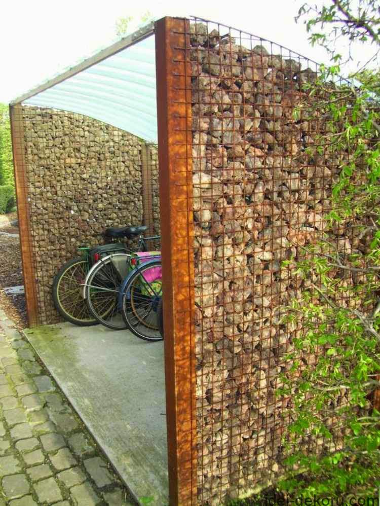 ideas-for-garden-fencing-Garden-fence-of-natural-stone-and-metal-for-bicycle